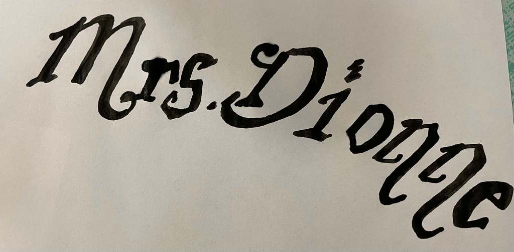 Calligraphy reading Mrs. Dionne