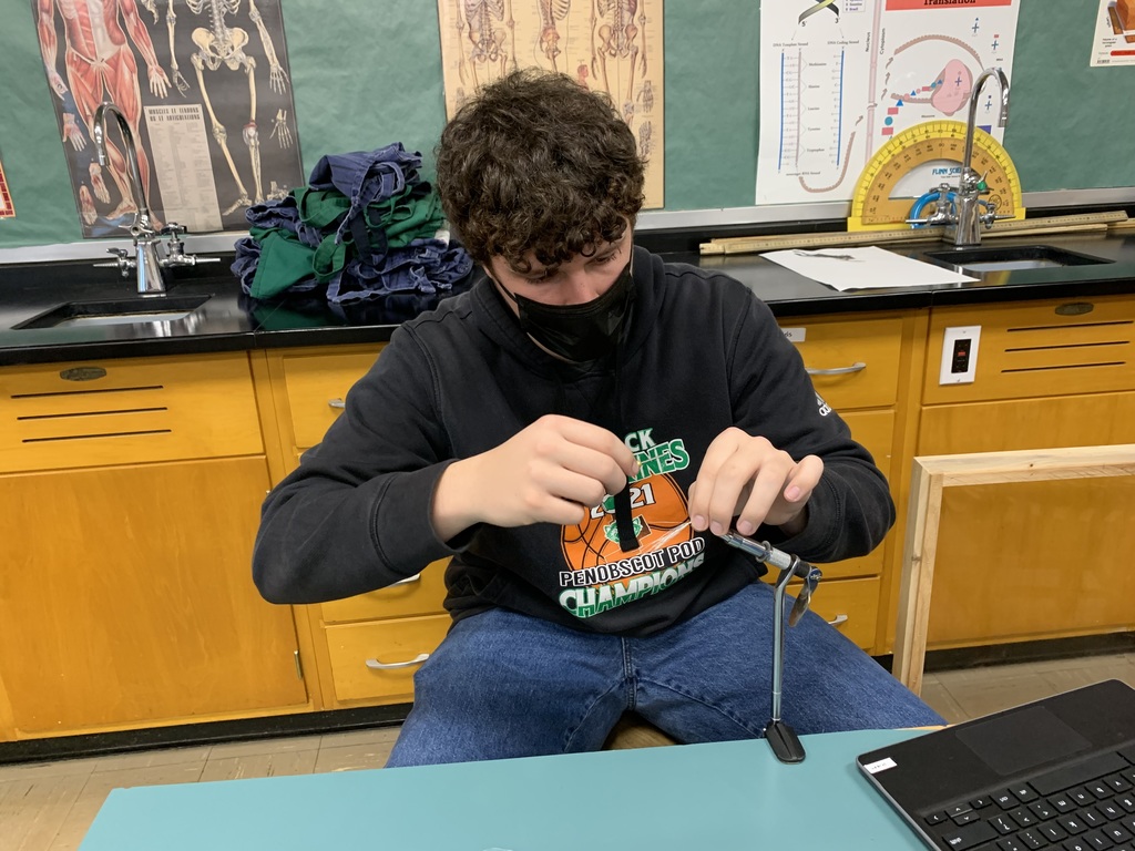 Student tying a fishing fly 